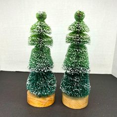 two small trees sitting on top of each other