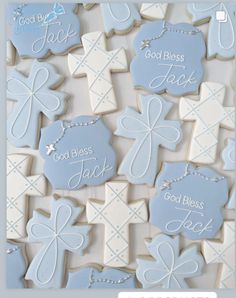 cookies decorated with blue and white icing that say god's blessing to each other