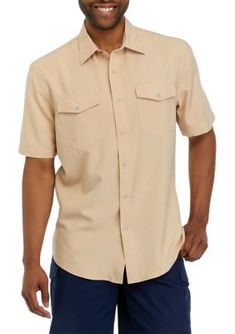 Classic and versatile, this solid button-down shirt from Ocean + Coast is finished with short sleeves, a point collar, and two pockets along the chest. | Ocean + Coast Men's Short Sleeve Chambray Western Button Down Shirt, Tan, Medium Solid Color Button-up Camp Shirt With Placket, Button-up Camp Shirt With Pockets, Solid Button-up Camp Shirt With Buttons, Summer Shirt With Flap Pockets And Spread Collar, Summer Collared Shirt With Flap Pockets, Summer Shirt With Welt Pockets, Summer Button-up Shirt With Flap Pockets, Solid Color Summer Shirt With Welt Pockets, Summer Business Casual Short Sleeve Shirt With Pockets