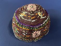 Antique Azerbaijan Tribal Silk Embroidery Skullcap & Hat. Fully couching silk embroidery on cotton with traditional floral and zoomorphic elements. Some natural colors along with non-natural ones. Used but well kept in good condition. Deep purple is a rare dominant color in such small items but she must love it and used it as major color. It still can be used. Size - Height : 10 cm x Circumference : 52 cm  Free Shipping. Traditional Embroidered Hats For Ceremonial Use, Traditional Embroidered Hats For Festivals, Traditional Embroidered Festive Hats, Traditional Multicolor Embroidered Hat, Traditional Embroidered Multicolor Hats, Skullcap Hat, Azerbaijan, Silk Embroidery, Skull Cap Beanie