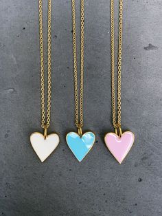 Sterling vermeil enamel heart charm necklace. Necklace is 18" in length. 18KT gold plate over sterling silver on heart charm and cable chain. Heart charm measures 14 mm x 17 mm. Available in three colors, choose from drop down menu. Follow us on instagram @pennyweightsjewelry! Heart-shaped Enamel Charms Necklaces, Heart-shaped Enamel Charms Necklace, Enamel Heart Charms Necklace, Gold Heart-shaped Enamel Necklace, Heart-shaped Gold Enamel Necklace, Gold Enamel Charm Necklace With Heart Charm, Gold Enamel Heart Charm Necklace, Chain Heart, Heart Charm Necklace