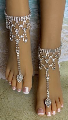 This elegant pair of barefoot sandals feature brilliant rows of rhinestone chain and rhinestone accents that adorn the ankle and top of the foot. A size adjusting marquis shaped toe ring holds the piece in place on the foot. Each piece detaches at the back of the ankle with a lobster claw latch. They are size adjustable and one size fits most. Comfortable and versatile, they will lend themselves to casual or formal events. My barefoot sandals are sold as a pair and are one size fits most All items are made in a smoke free environment * If there is any issue with your footwear, please let me know so that I can correct it Thanks for visiting my shop! 👣 Crystal Barefoot Sandals, Barefoot Sandals Beach Wedding, Columbia Tn, Beach Wedding Sandals Barefoot, Cute Toe Nails, Sandals Beach, Jewelry Beach, Cute Toes, Rhinestone Chain