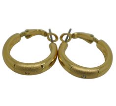 "#37664 Vintage gold tone hoop earrings featuring a textured center section accented with a white rhinestone and polished sides, with lever back hoop earring backs. No makers mark. CONDITION Good Overall - Gentle wear DIMENSIONS 1\" x 0.25\" x 1\" (Width x Depth x Height)" Rhinestone Hoop Earrings, Wilton Armetale, Vintage Texture, White Rhinestone, Gold Texture, Jewelry Earrings Hoops, Earring Backs, Gold Style, Makers Mark