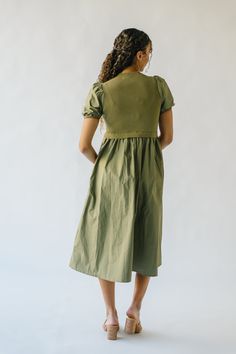 Stay cool and chic in The Fanelli Knit Bodice Midi Dress. This unique dress features a playful olive color and a comfortable knit bodice. Perfect for any occasion, it's sure to make a statement (and keep you comfortable!) all day long. Don't miss out on this quirky and stylish addition to your wardrobe! Details self: 60% cotton + 40% polyester lining: 52% viscose + 26% polyester + 22% nylon Fabric Care Guide Here Sizing & Fit Measurements are approximate and taken while laying flat across the fr Knee-length Khaki Dress For Fall, Khaki Knee-length Dress For Fall, Khaki Knee-length Fall Dress, Casual Green Knee-length Sweater Dress, Chic Green Knit Midi Dress, Casual Knee-length Khaki Dress, Casual Khaki Knee-length Dress, Khaki Midi-length Dress For Fall, Khaki Midi Length Dress For Fall