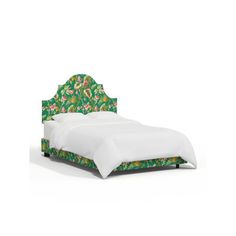 a bed with a green headboard and floral print on the frame, against a white background