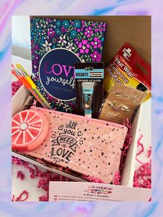 an open box filled with lots of different types of items and writing on the inside