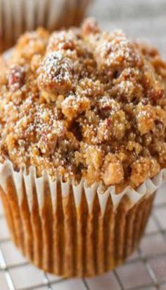 a muffin sitting on top of a cooling rack