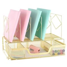 three different colored file folders in a metal holder