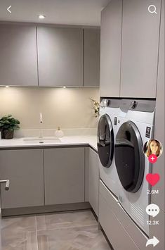 a washer and dryer sitting in a kitchen next to a counter top oven