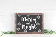 a merry and bright sign on a mantle