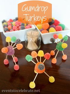 gumdrop turkeys are displayed in front of a bowl of candies and a sign that says gumdrop turkeys