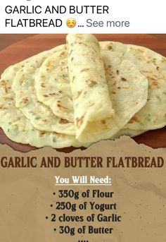 garlic and butter flatbreads on a wooden board with instructions for how to make them