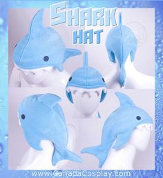 there are four hats made to look like dolphins