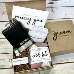 the grooms gift box is filled with personalized items and has a card that says i can't wait to marry you