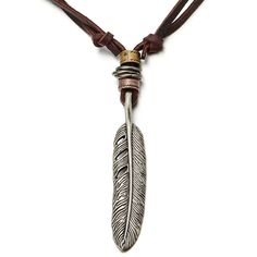 PRICES MAY VARY. Unique Design: The necklace features a feather pendant inspired by Native American culture, symbolizing freedom and spiritual enlightenment. Retro Style: The blend of antique finishing on the pendant and the brown leather cord add a nostalgic, retro flair to your outfit. Adjustable Leather Cord: The necklace's length is easily adjusted thanks to the smooth sliding knot of the leather cord, ensuring a comfortable fit for all. Versatile Accessory: Suitable for various occasions an Mens Choker Necklace, Feather Pendant Necklace, Aromatherapy Jewelry, Old Metal, Jewelry Pliers, School Jewelry, Detailed Jewelry, Necklace For Girlfriend, Dangle Necklaces