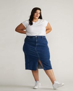 This is the denim skirt of your dreams. It's part bohemian, part western, and part fashionably modern. The perfect pencil silhouette is made from our soft denim fabric with invisible stretch and boasts a brand-new wash. With a mid-rise fit, it features a subtle deconstructed look with patchwork seaming and a raw hem. We paid particular attention to the trims and finishes—the raw hem looks clean and intentional, and the custom topstitching was chosen just for this skirt.