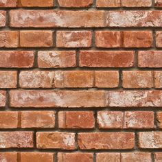 an old brick wall is shown in this image