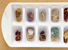 a tray filled with lots of different types of rings