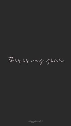 this is my year written in cursive writing on a black background with the words'this is my year '