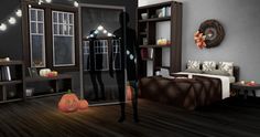 a room decorated for halloween with pumpkins and decorations