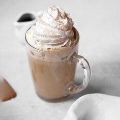 a cup of hot chocolate with whipped cream on top