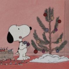 a cartoon dog standing in front of a christmas tree