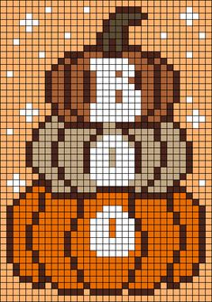 a cross stitch pattern with a pumpkin on it