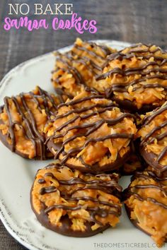 no bake samma cookies on a plate with chocolate drizzled over them