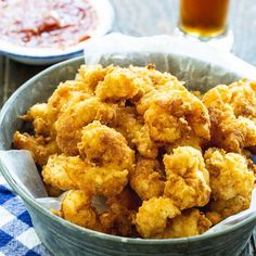 some fried food in a bowl on a table