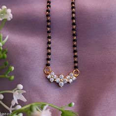 Mangalsutra Chain, Pearl Wedding Ring, Black Beads Mangalsutra, Black Beads Mangalsutra Design, Gold Diamond Wedding Rings, Synthetic Diamond, Gold Chain Design, Gold Necklace Simple, Black Beaded Jewelry