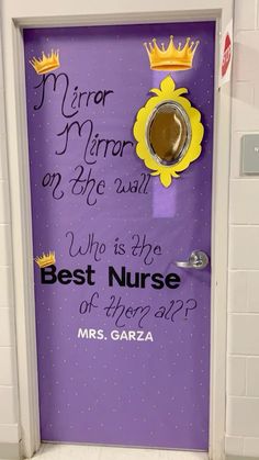 a purple door decorated with a crown and the words,'best nurse ever? '