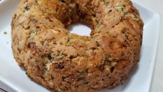 a close up of a doughnut on a plate