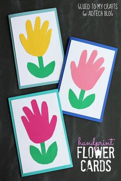 two cards with flowers painted on them, one is pink and the other is yellow