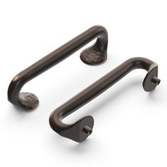 an image of two metal handles on a white background