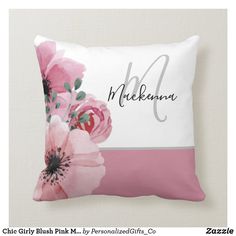 a pillow with pink flowers on it and the word makkama written in cursive writing