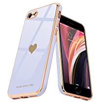 an iphone case with a heart on the front and back sides, both in gold