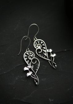 ITEM DESCRIPTION: Size H 6 x W 2 cm (2 x 2/3 inches) with closure. Weight - 3 g of each other, very light and comfortable. Absolutely wonderful and unique silver earrings with fern koru and ginkgo leaves. These plants intertwine, grow and look almost alive. I made these botanical earrings without gemstones. But you can order them with different gemstones if you want. Jewelry will come to you in a gift box - ready for gifting. More jewelry with fern leaves in my shop: https://www.etsy.com/shop/Ur Sterling Silver Leaf Earrings With Ear Wire, Nickel Free Leaf-shaped Sterling Silver Jewelry, Unique Nickel-free Leaf-shaped Jewelry, Hypoallergenic Sterling Silver Leaf-shaped Earrings, Nickel-free Leaf-shaped Nature-inspired Earrings, Handmade Leaf-shaped Sterling Silver Jewelry, Nickel Free Leaf-shaped Sterling Silver Earrings, Silver Leaf-shaped Handmade Earrings, Handmade Silver Botanical Earrings