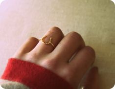 R I N G D E T A I L S I handcraft this horseshoe ring out of 14kt. yellow gold filled (additional gold filled information below) The horseshoe is hand shaped and lightly hammer it to give it light reflecting facets. It is finished at a high polish P R O D U C T I O N ~ T I M E : Depending on my current amount of orders, it usually takes me 1-2 weeks to craft your item. Available in sterling silver: https://www.etsy.com/listing/180790510/horseshoe-ringsterling-silverhandcrafted? Or Dual color (go 14k Gold Horseshoe Ring, Horseshoe Ring, Chevron Ring, Green Lake, Hand Shapes, Gold Filled Jewelry, 14kt Gold, Gold Plated Jewelry, Jewelry Plate