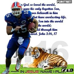 a football player running with a tiger laying on the ground in front of him and an inspirational quote