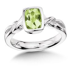 Sterling silver bezel set peridot ring. Size 7. Complimentary sizing available. Modern Peridot Rings For Anniversary, Elegant Peridot Stackable Rings For May Birthstone, Lime Green Peridot Rings Fine Jewelry, Formal Lime Green Peridot Rings, Lime Green Peridot Rings For Promise, Lime Green Sterling Silver Rings With Accent Stones, Classic Peridot Solitaire Jewelry, Elegant Green Peridot Stackable Rings, Lime Green Peridot Rings In Fine Jewelry Style