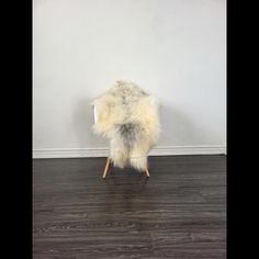 a chair that has some fur on it