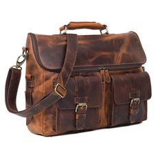 This top-grain leather laptop bag is perfect for travel and everyday use. With its spacious interior, it can accommodate up to a 16" laptop, as well as notebooks, tablets, and other essentials. The bag features multiple compartments and pockets, making it easy to organize your belongings. The adjustable shoulder strap ensures a comfortable fit, while the sleek design makes it a stylish accessory that can be dressed up or down. Whether you're a business professional or a student, this laptop bag is the perfect way to keep your essentials organized and secure. SIZE- 15 x 11.5 x 3.5 INCHES Leather Briefcase For Travel, Brown Shoulder Bag With Laptop Sleeve For Business Trips, Soft Leather Travel Briefcase, Leather Laptop Bag For Travel, Rugged Rectangular Laptop Bag For Everyday Use, Rugged Leather Laptop Bag For Travel, Rugged Briefcase For Daily Use, Classic Leather Backpack With Laptop Sleeve, Rugged Leather Satchel Laptop Bag