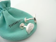 Overview: Offered for sale is a pair of classic and super cool Tiffany and Co. Sterling Silver 1837 Concave Cuff Links. Beautiful piece of "jewelry" that every man or woman can appreciate! Perfect surprise for that someone special! The pair is in excellent condition! The links are fully hallmarked and guaranteed to be 100% authentic.You will not regret purchasing these! :)It will come with its Tiffany pouch as shown! Perfect and ready for gifting!Wonderful present for yourself or anyone you love Luxury Screw Back Jewelry As Gift, Designer Silver Cufflinks Gift, Luxury Screw Back Jewelry As A Gift, Sterling Silver Jewelry With Palladium Hardware As Gift, Luxury Sterling Silver Cufflinks For Gift, Luxury Engraved Cufflinks For Gift, Luxury Engraved Cufflinks As Gift, Loyalty Program, Tiffany And Co