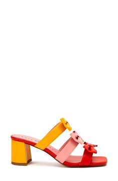 Dainty bows accent the straps of a block-heel sandal that adds contemporary character to any look. 2 1/2" heel Textile and synthetic upper/textile lining/synthetic sole Imported Orange Block Heel Sandals For Evening, Orange Sandals With Padded Block Heel, Chic Orange Sandals With Buckle Closure, Pink Sandals With Contrasting Block Heel, Pink Block Heel Sandals With Contrasting Heel Counter, Shoes World, Bow Sandals, Dress Sandals, Mid Heel