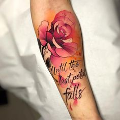 a person with a tattoo on their arm that says, until the past perfect falls