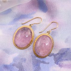 Pink Tourmaline Drop Earrings in 18k Yellow Gold, Statement Earrings, Bridal Earrings, Wedding Earrings These breathtaking Mid-Century earrings feature pink tourmaline gemstones in 18 karat yellow gold. Two (2) 12.11 carat tourmalines, each with a rose pink hue, are set in engraved bezels. Photogenic and fabulous! Shop More Drop Earrings. PRIMARY STONE Stone: Natural Pink Tourmaline Measurements: 18.93 mm x 14.24 mm x 5.30 mm = 12.11 ct (2) Weight: 24.22 ct Shape: Cabochon CHARACTERISTICS Measur Mid Century Earrings, Gold Statement Earrings, Earrings Wedding, Tourmaline Gemstone, Pink Tourmaline, Wedding Earrings, Bridal Earrings, Pink Roses, Statement Earrings