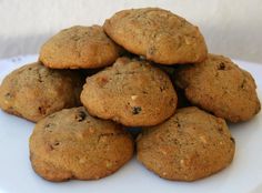 a pile of cookies sitting on top of a white plate