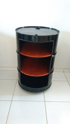 a black and red shelf sitting on top of a white tiled floor