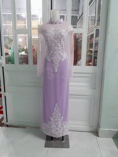 You can customize the ao dai. Please send me your exact measurements. Please make sure your measurements are accurate. I will contact you prior to making the ao dai to confirm that the measurements are correct. You will receive your dress within 10-14 days. The dress comes with the pants. Elegant Long Ao Dai For Traditional Ceremonies, Long Fitted Gown For Traditional Ceremonies, Traditional Floor-length Ao Dai For Wedding, Floor-length Ao Dai For Ceremonies, Fitted Floor-length Ao Dai For Ceremony, White Long Sleeve Cheongsam For Wedding, Long Cheongsam For Wedding, Full Length Fitted Ao Dai For Wedding, Traditional Vietnamese Wedding