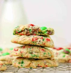 three cookies stacked on top of each other with sprinkles and chocolate chips